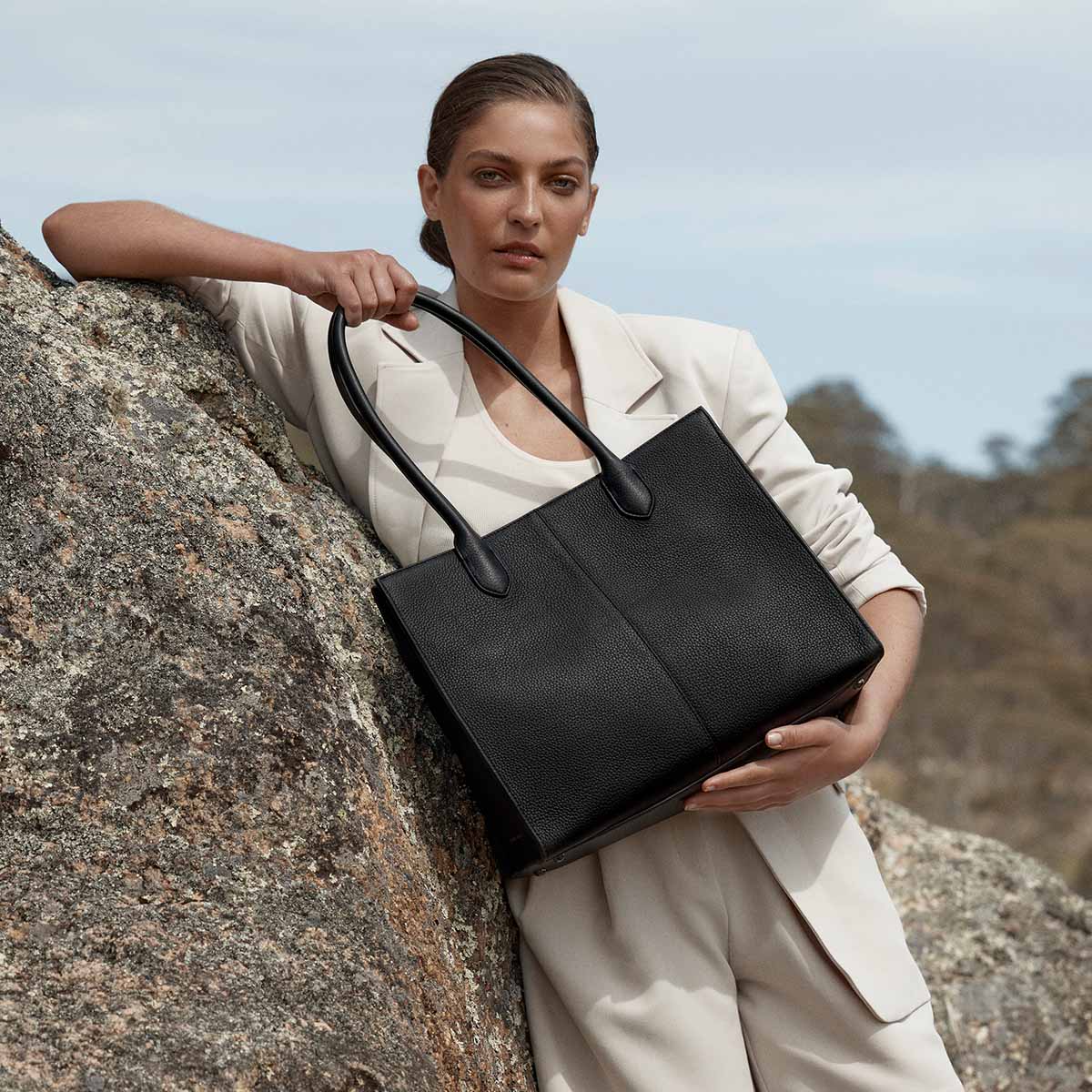 Status Anxiety Without Warning Leather Tote Bag Black