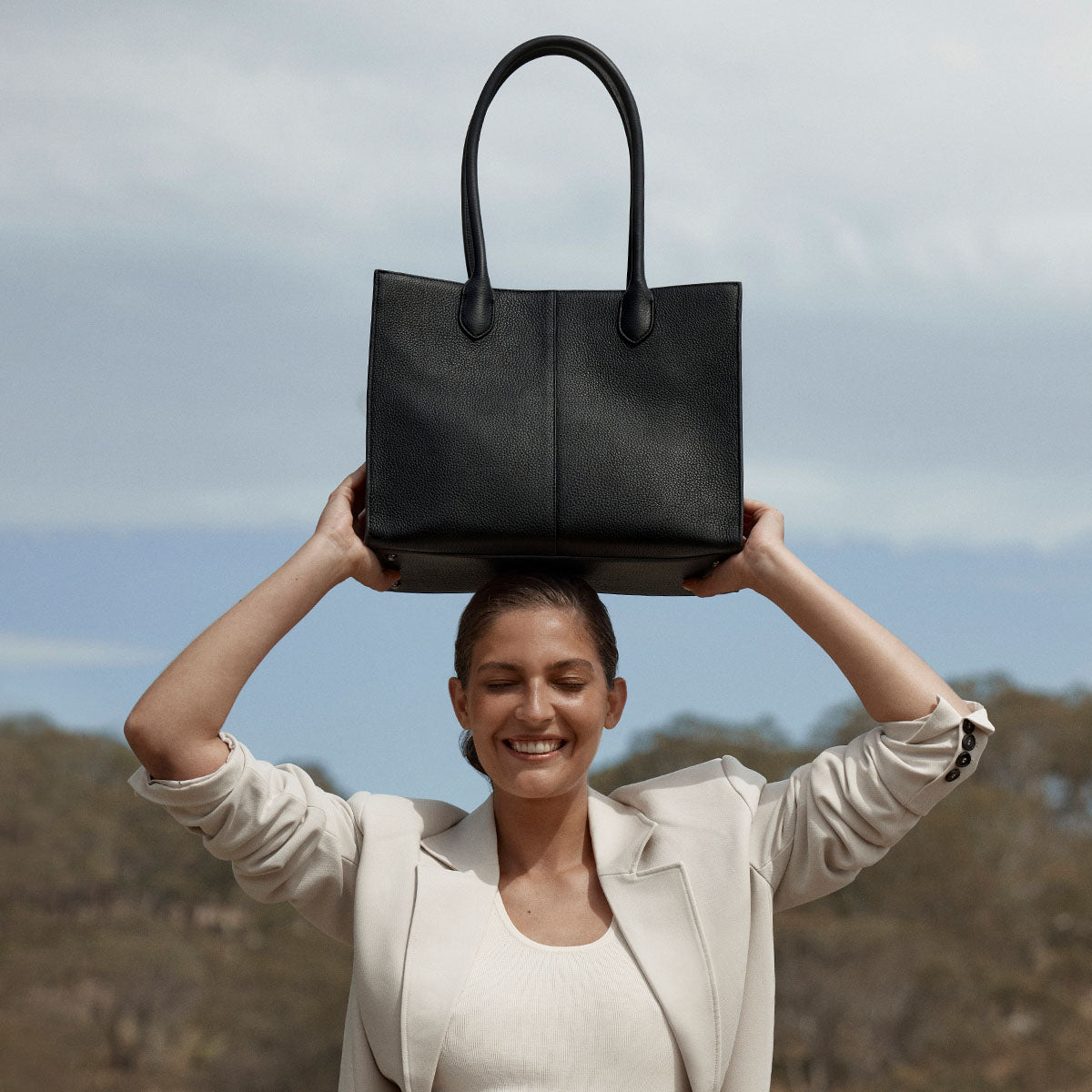 Status Anxiety Without Warning Leather Tote Bag Black