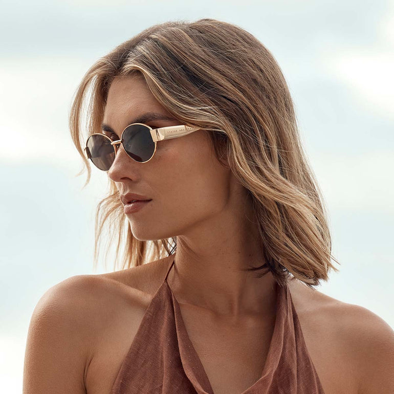 Status Anxiety Spherical Sunglasses Gold