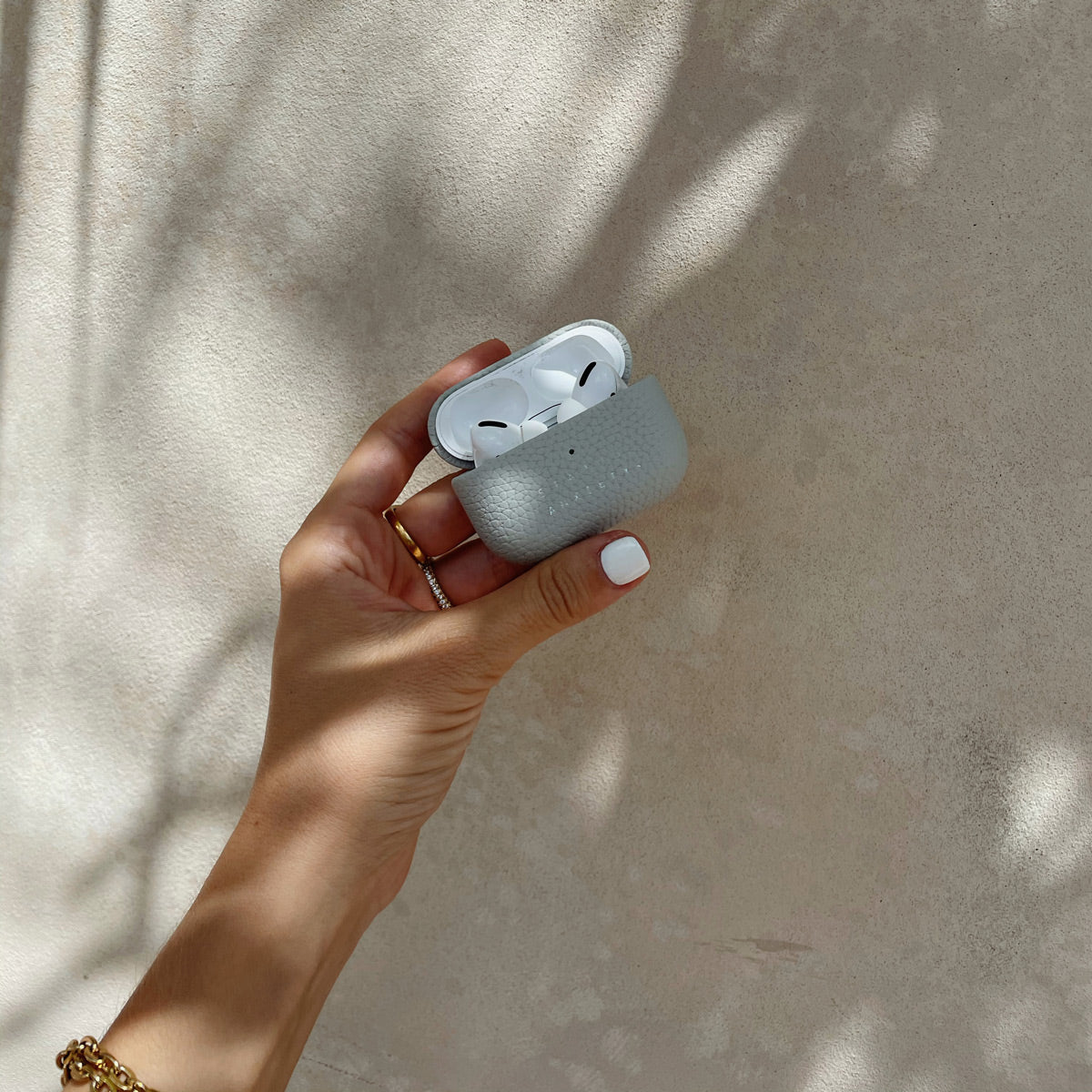 Status Anxiety Miracle Worker Leather Airpods Case Light Grey