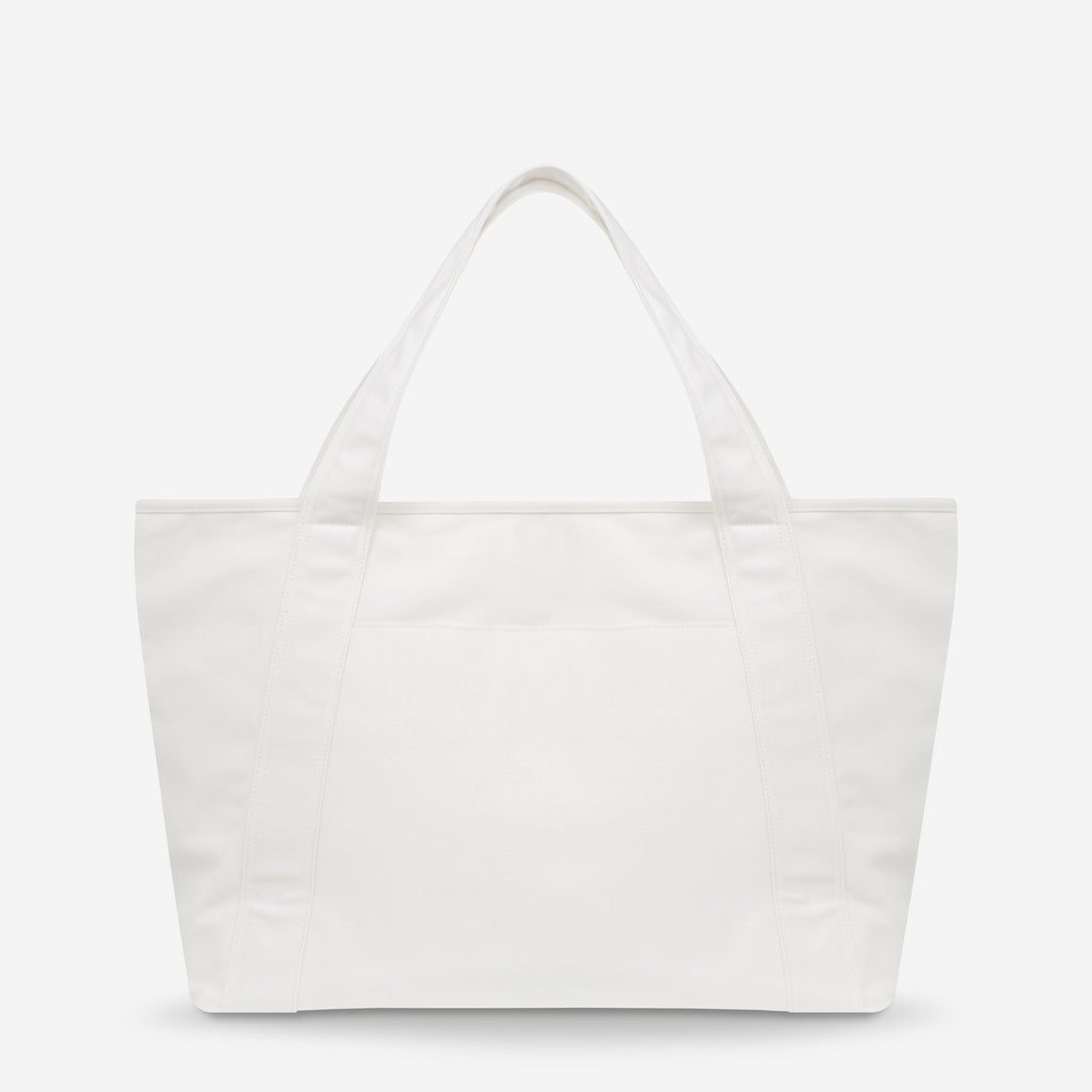 In the Light White Beach Tote Bag | Status Anxiety®