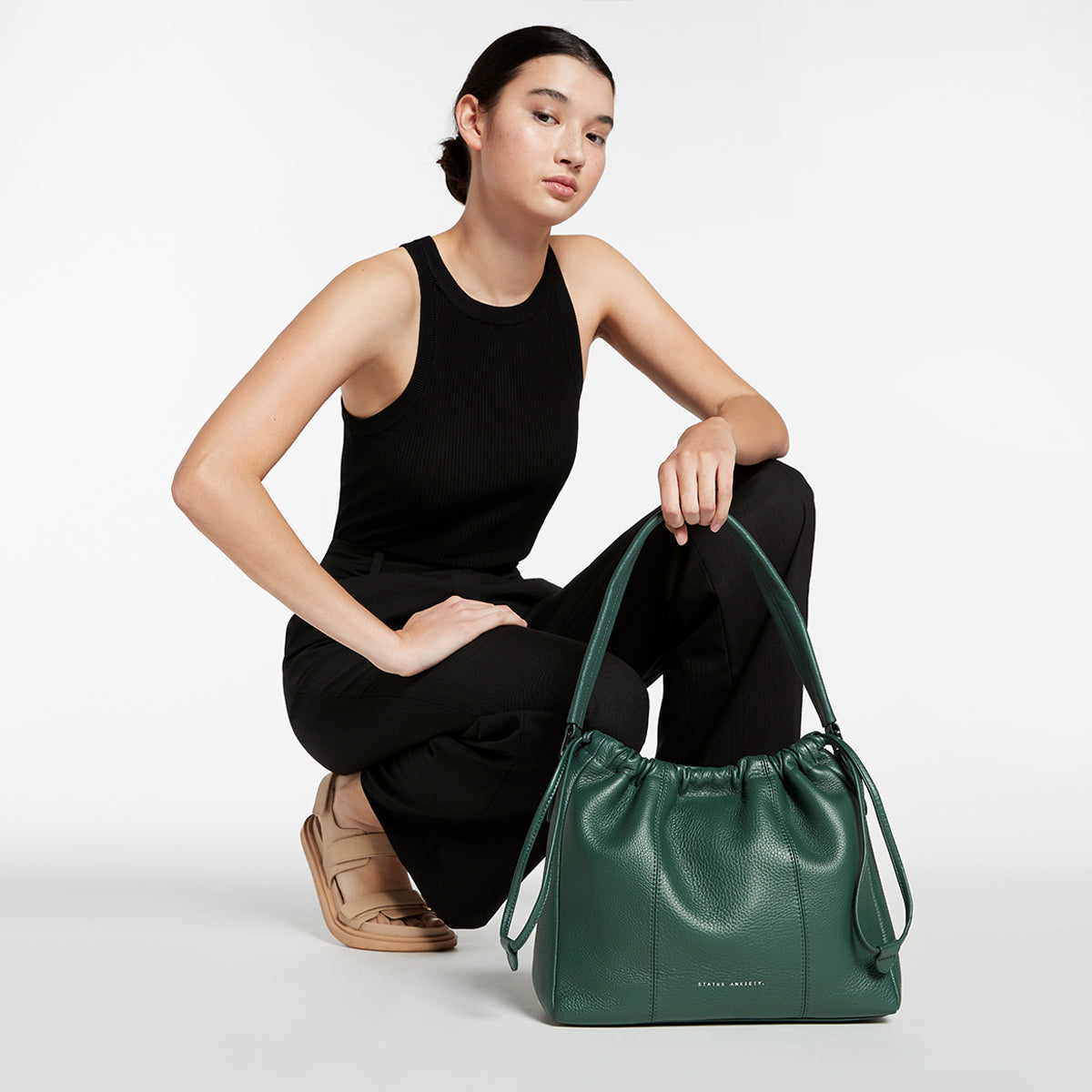 Status anxiety green discount bag